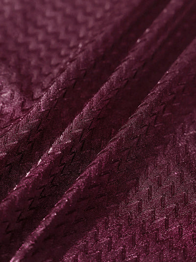 Bañador enterizo burdeos con textura y espalda descubierta