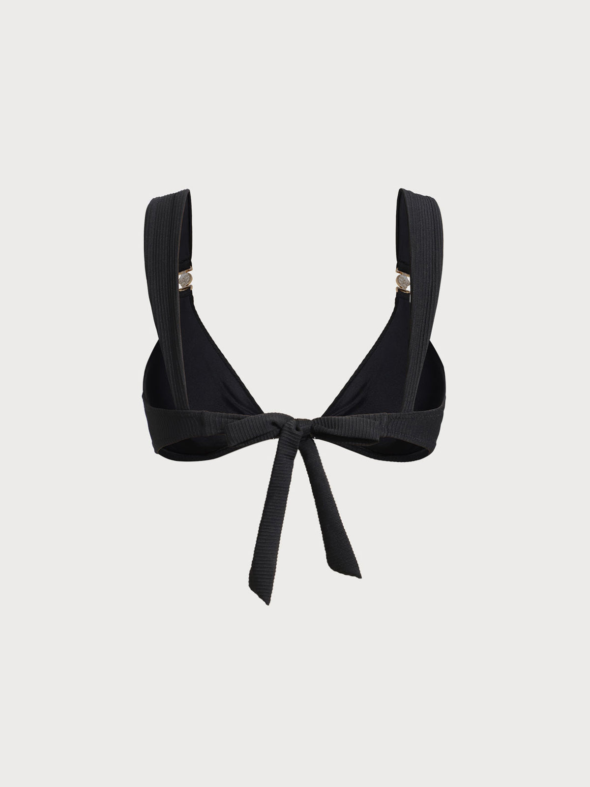 Top de bikini negro con detalles dorados