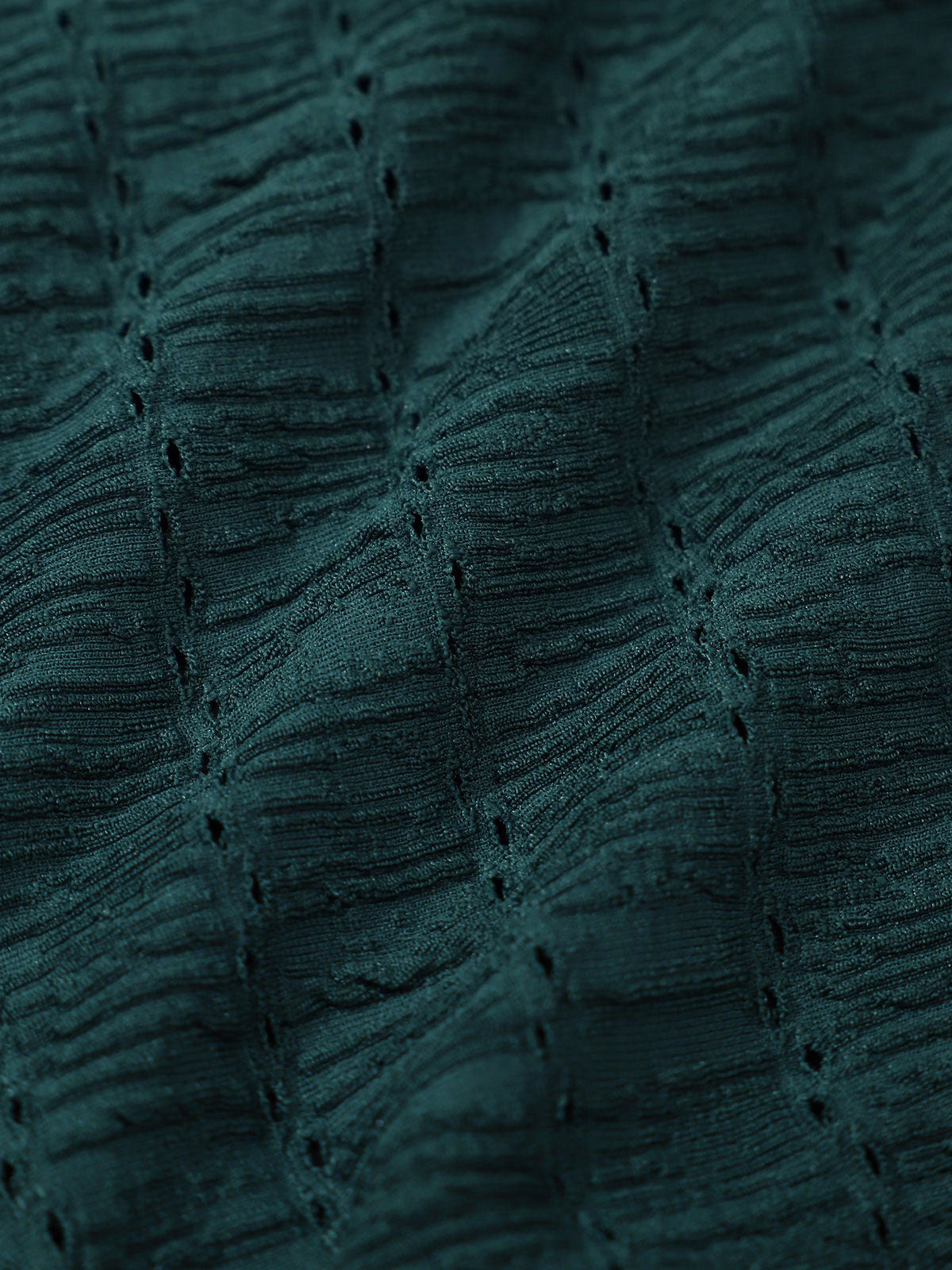 Bañador enterizo verde oscuro con textura y escote profundo